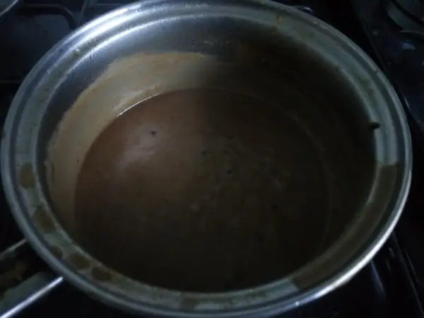 Peppercorn sauce still cooking