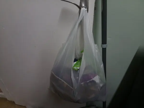 Carrier bag on door handle