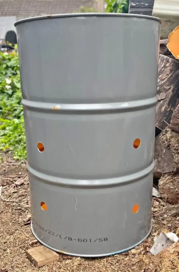 Burning barrel with holes